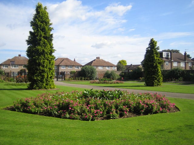 Cedars Park in Cheshunt, a landscaped public park with flower beds and mature trees